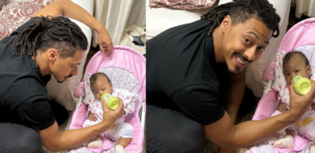 Luis Navarro da mamadeira à filha Zuri